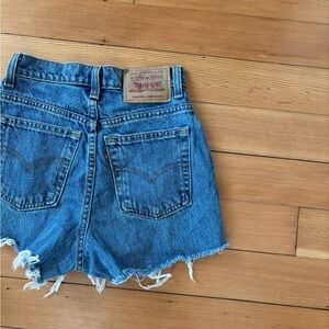 1990s vintage Levi’s ‘personal pair’ mid blue cut off shorts made in USA